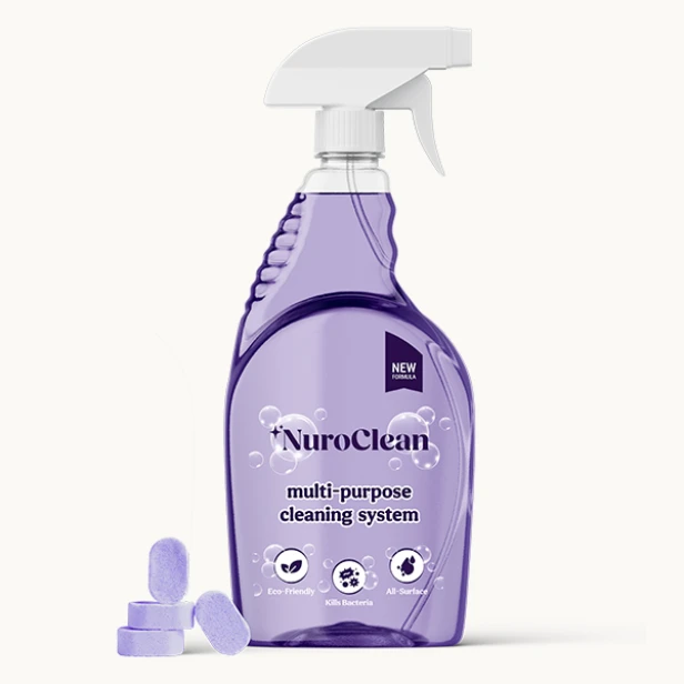NuroClean purple multipurpose spray bottle with white trigger beside loose purple cleaning tablets.